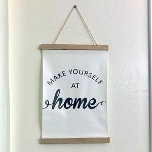Hanging Canvas Print “Make yourself at home”.